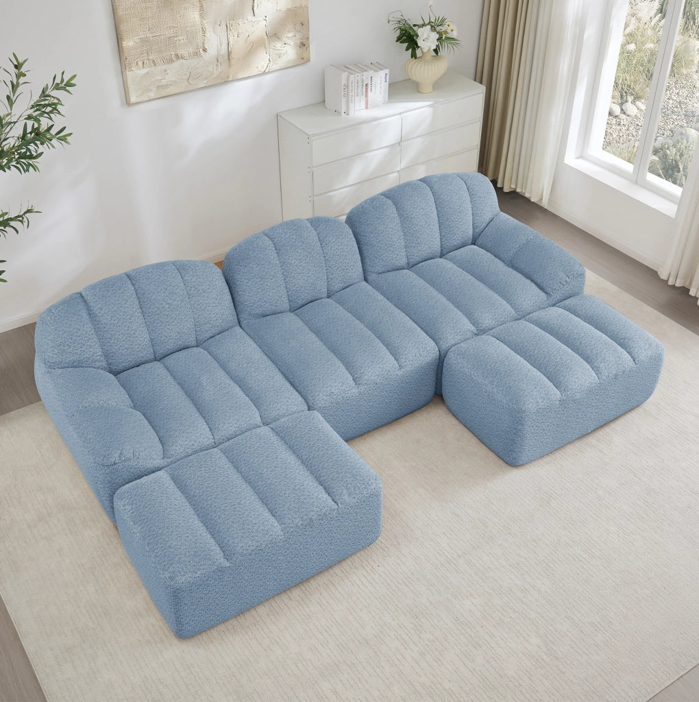 Divano modulare a 3 posti con ottomano in schiuma 32D e pile granulato blu