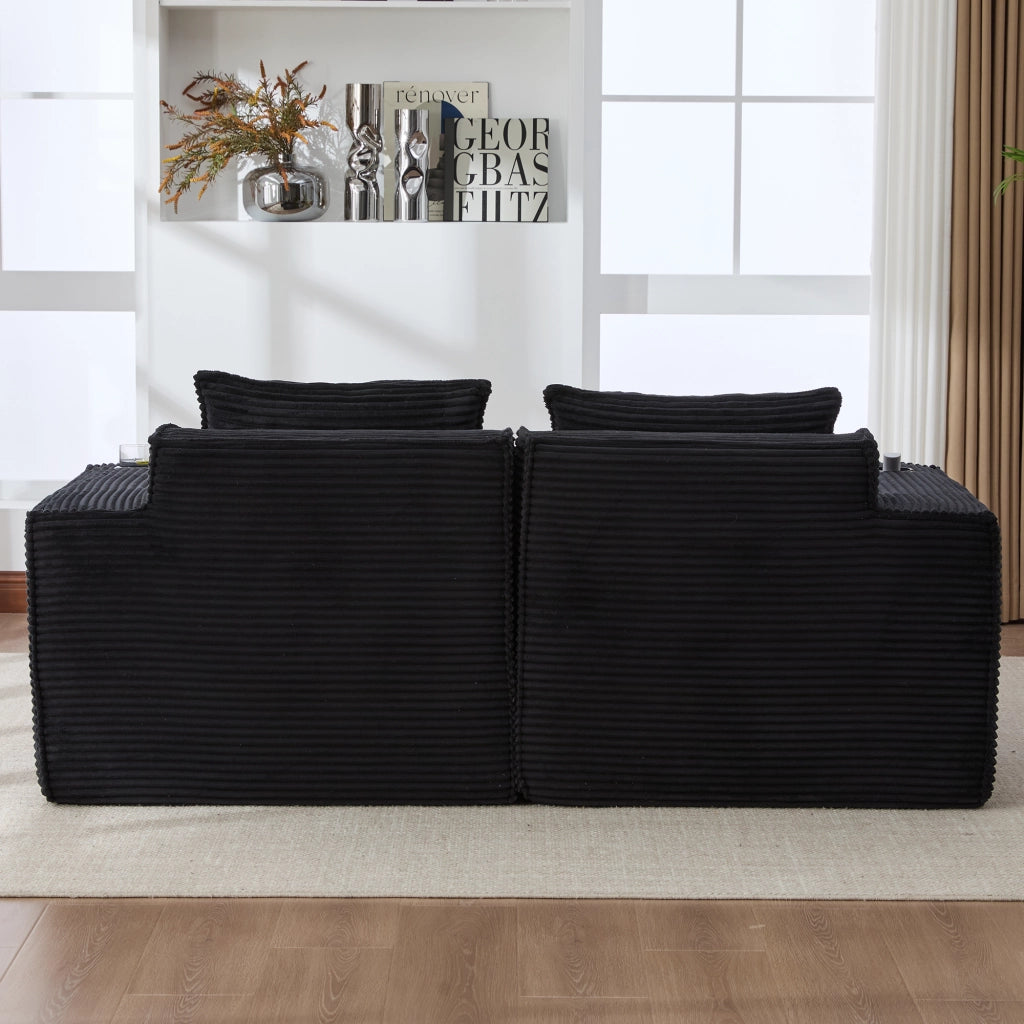 Divano modulare 2 posti con 2 pouf; portabicchieri e tasche laterali; in tessuto a coste nero
