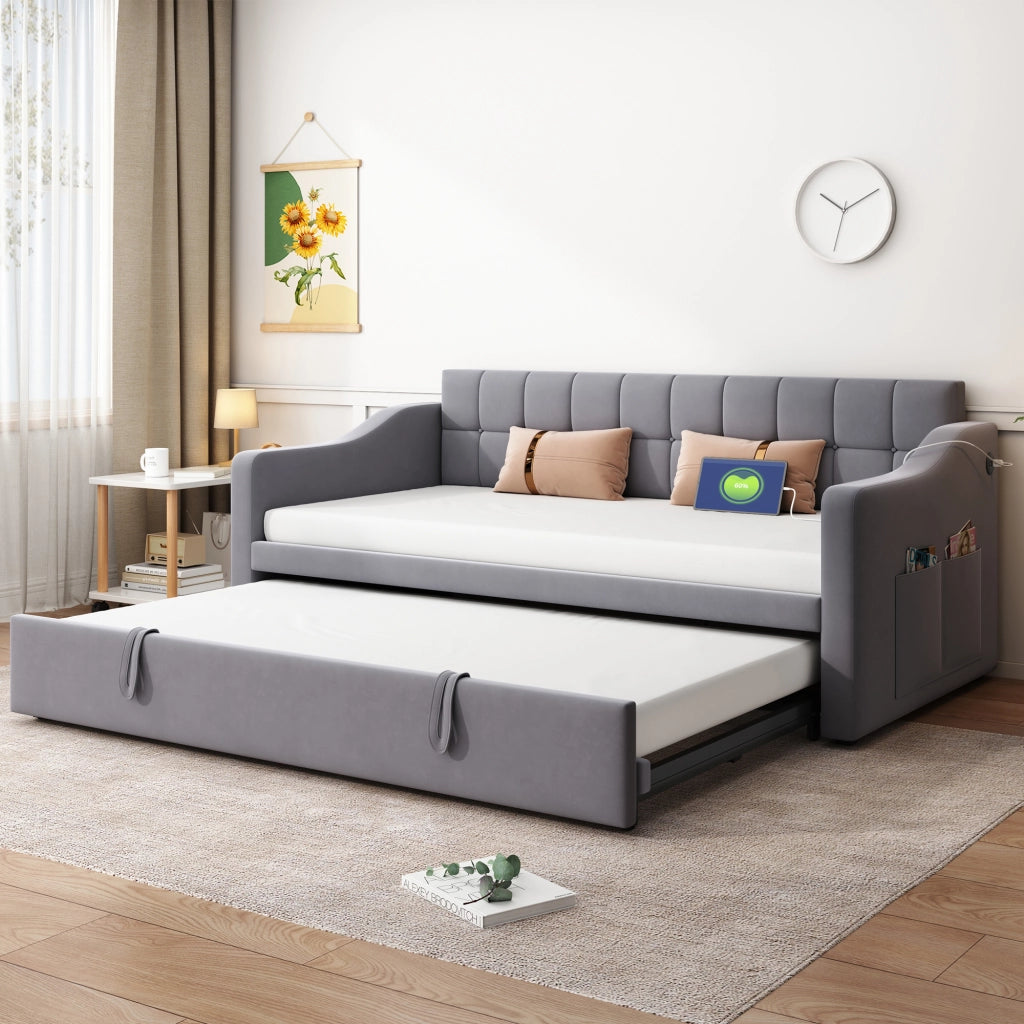 Letto divano estraibile 90×190 e 180×190 cm; 2 posti con porte USB sui braccioli; senza materasso; velluto grigio