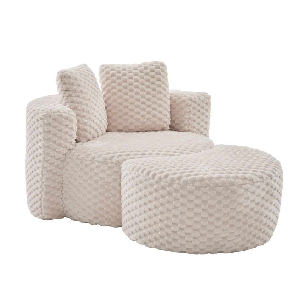 Poltrona compatta con pouf, design avvolgente e rivestimento in tessuto