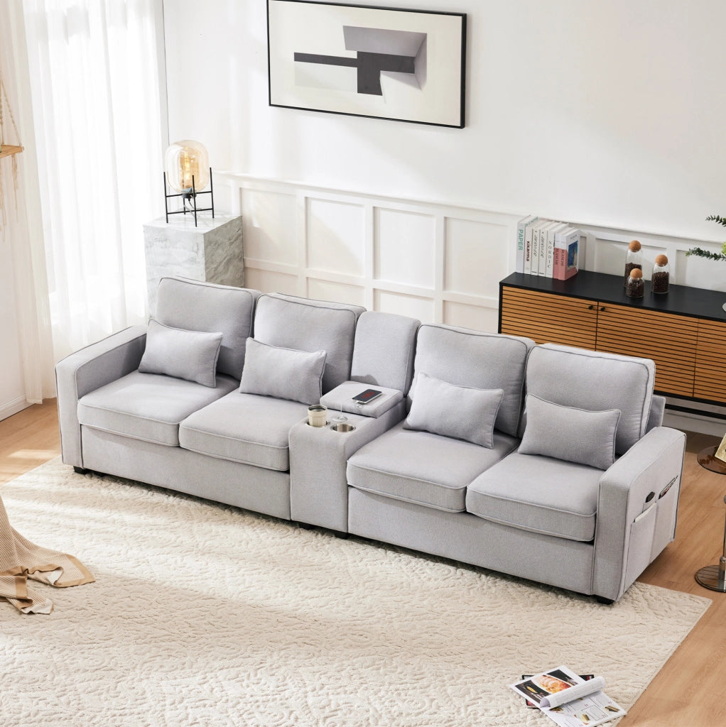 Divano 4 posti 290x83x88 cm con USB; portabicchieri e vani; tessuto grigio