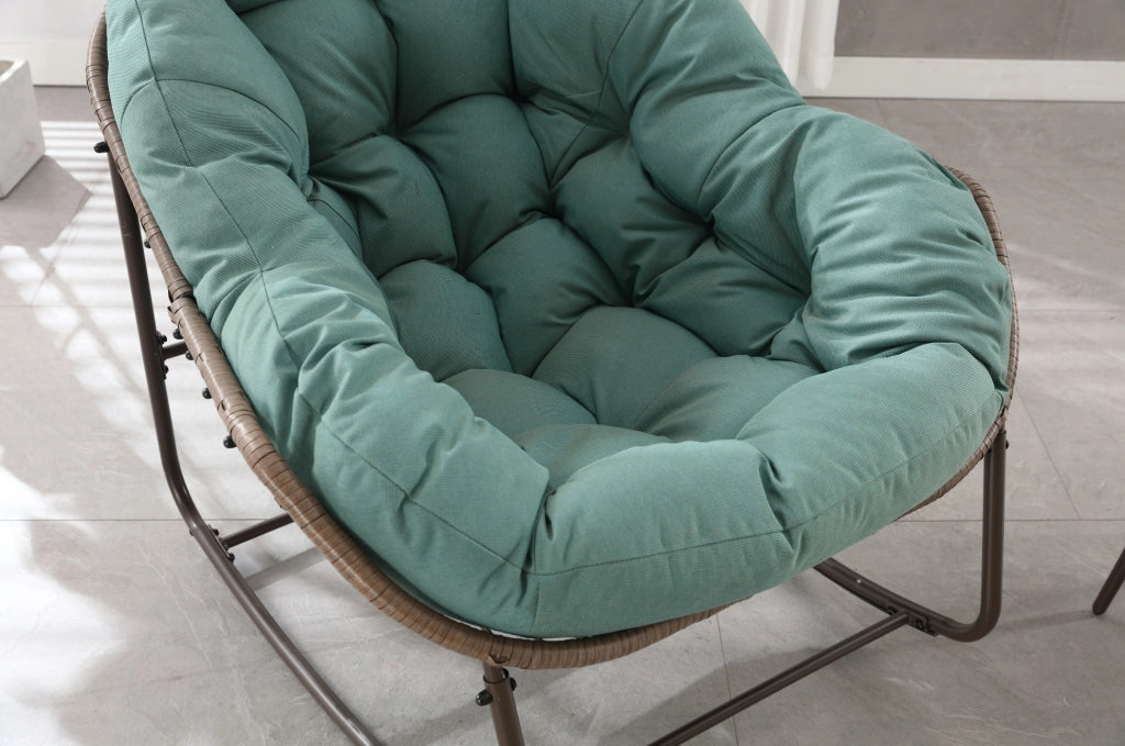 Poltrona a dondolo a uovo da esterno in rattan sintetico verde con cuscino; 78x106x90 cm