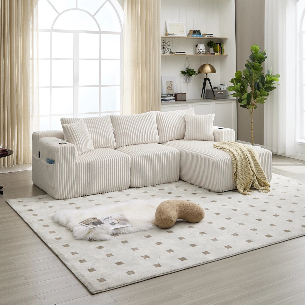 Set divano beige in velluto a coste con chaise longue, modulo 2 posti e 5 cuscini