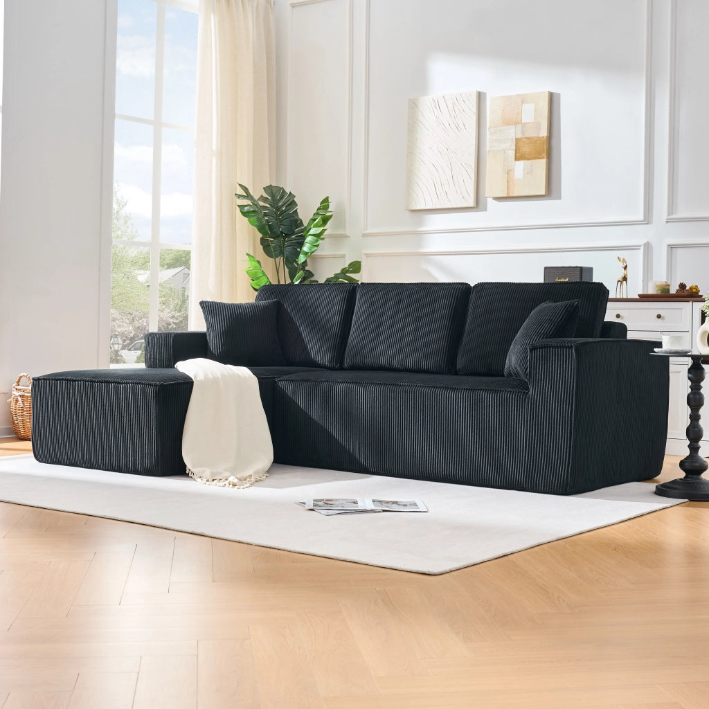 Divano angolare modulare 2 posti con chaise longue, 2 cuscini e braccioli larghi in velluto a coste nero