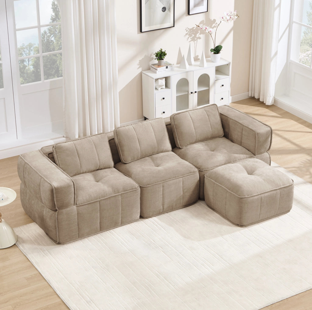 Divano angolare modulare 271x162x67 cm in poliestere sabbia con pouf