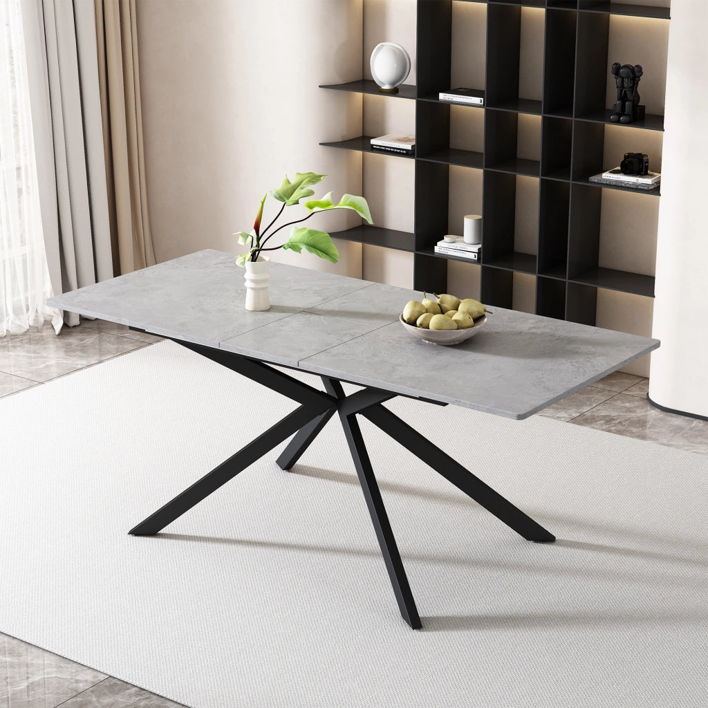 Tavolo da pranzo allungabile in MDF nero e grigio con gambe incrociate, versatile e moderno