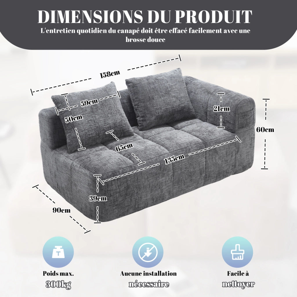 Divano 2 posti imbottito grigio con chaise longue, cuscino e tasche laterali per telecomando e cellulare