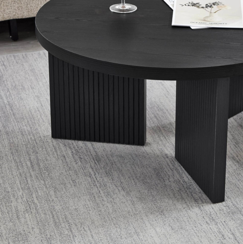 Tavolino da caffè rotondo in MDF nero con design scanalato