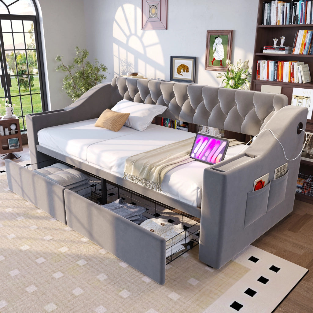 Divano letto imbottito 90x190 cm con cassetti; vani nei braccioli; porte USB; velluto grigio chiaro