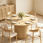 Tavolo da pranzo rotondo Ø 120 cm in finitura legno naturale con base cilindrica scanalata