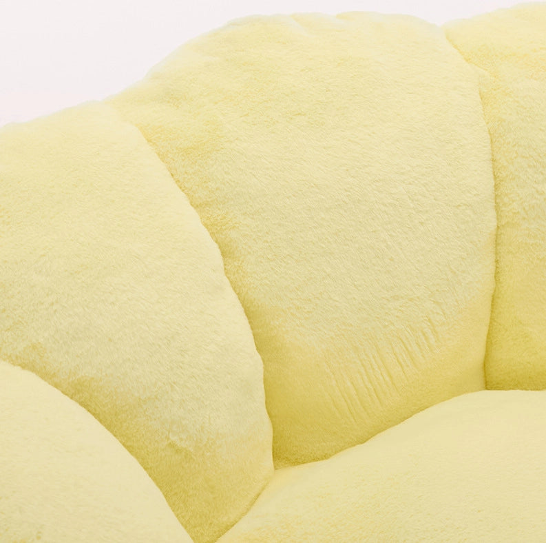 Poltrona compatta a forma di loto in tessuto plush giallo HAVRYA
