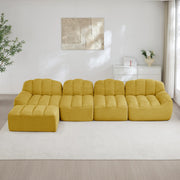 Divano modulare a 4 posti con 1 ottomano; forma a conchiglia; giallo