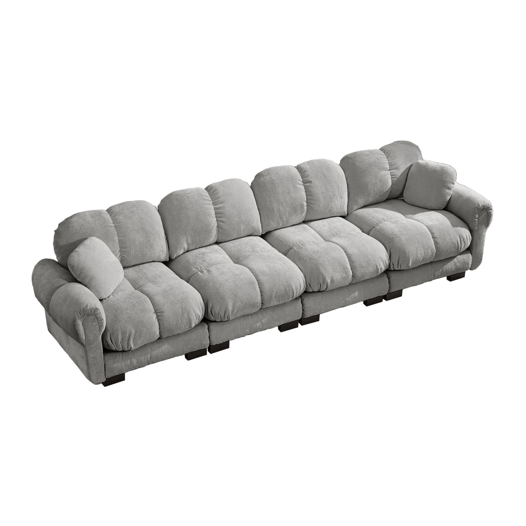 Divano modulare 330x86x90 cm con cuscini trapuntati e schienale curvo; ciniglia grigio chiaro