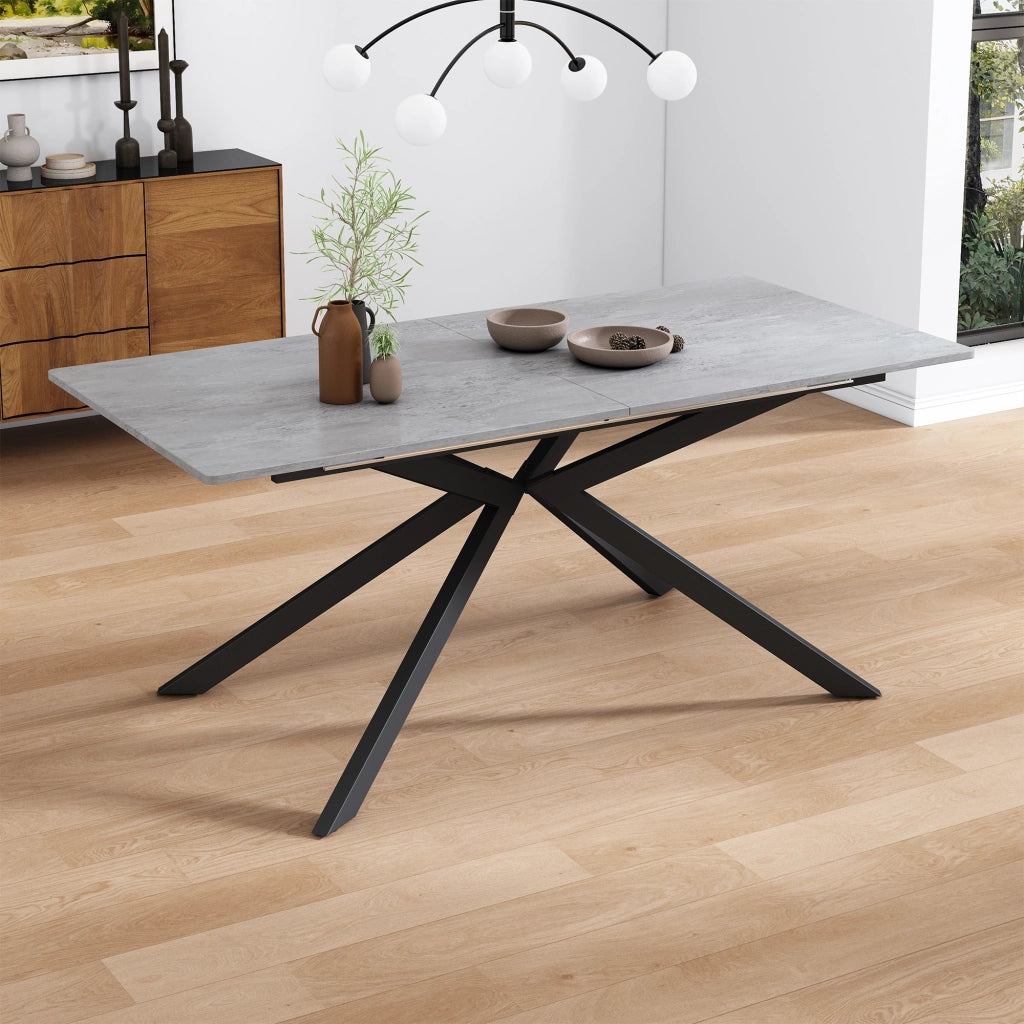 Tavolo da pranzo allungabile in MDF nero e grigio con gambe incrociate, versatile e moderno