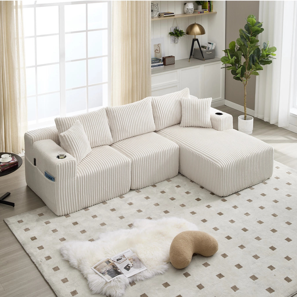 Set divano beige in velluto a coste con chaise longue, modulo 2 posti e 5 cuscini