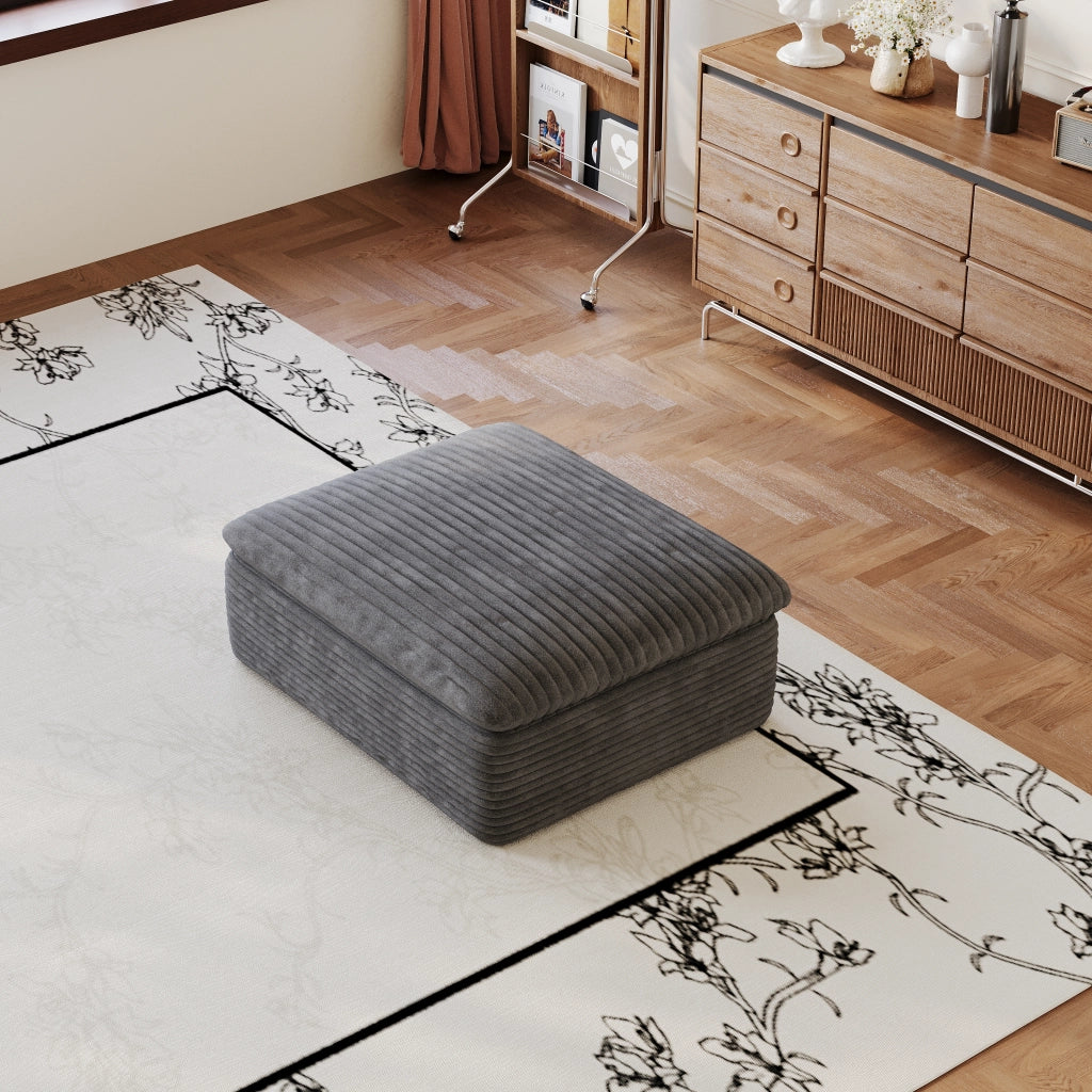 Divano modulare in tessuto grigio scuro con supporto interamente in schiuma e tecnologia di compressione