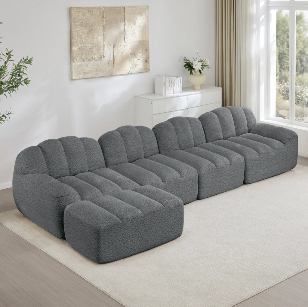 Divano modulare 4 posti con pouf, imbottitura in schiuma ad alta densità 32D, rivestimento in fleece grigio, ideale per soggiorno
