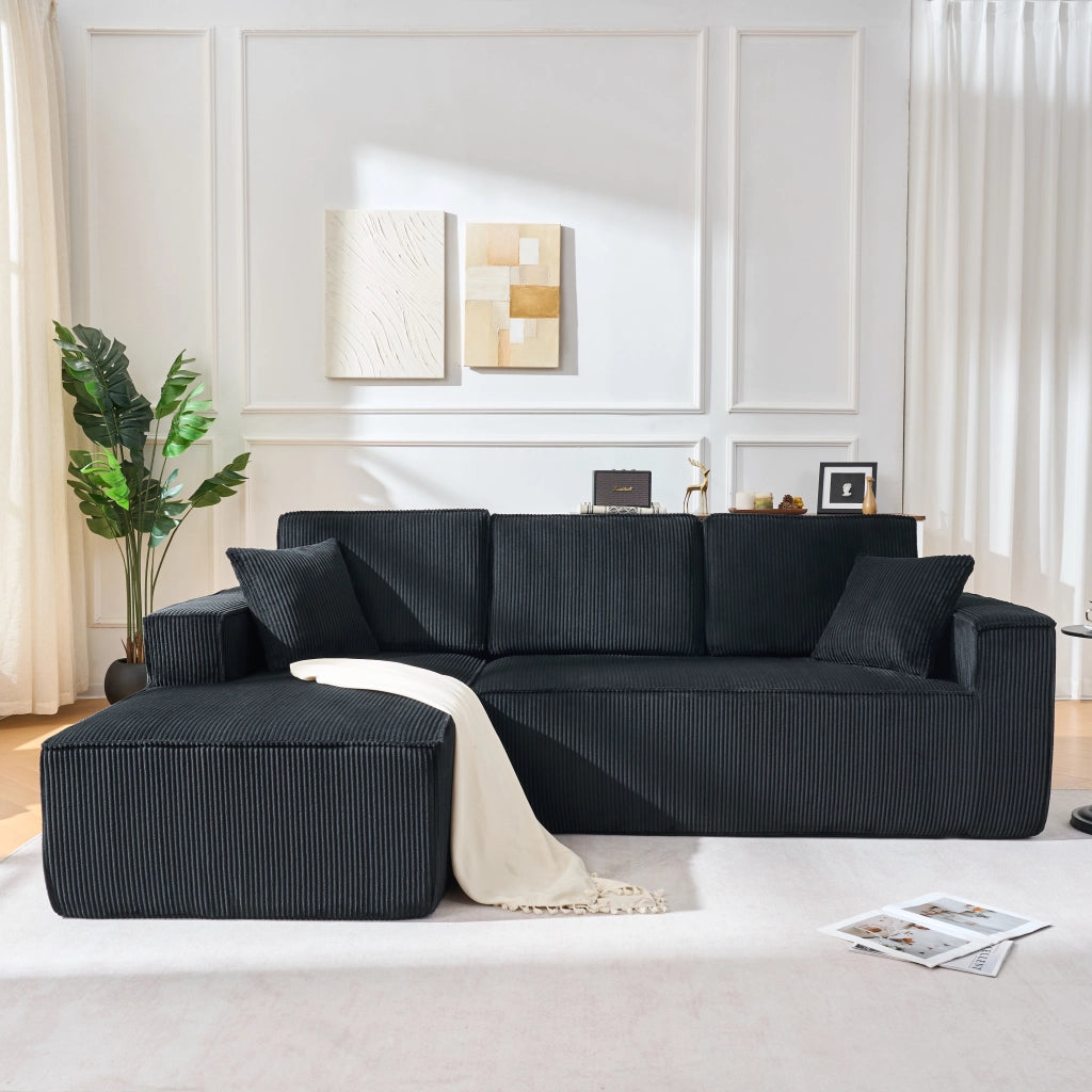 Divano angolare modulare 2 posti con chaise longue, 2 cuscini e braccioli larghi in velluto a coste nero