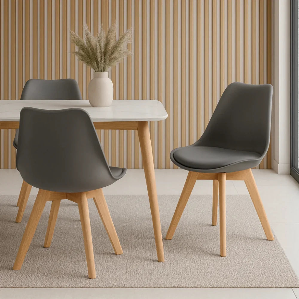 Set di 4 sedie da pranzo imbottite in polipropilene grigio scuro Lola con struttura in legno facili da pulire | Duzzle