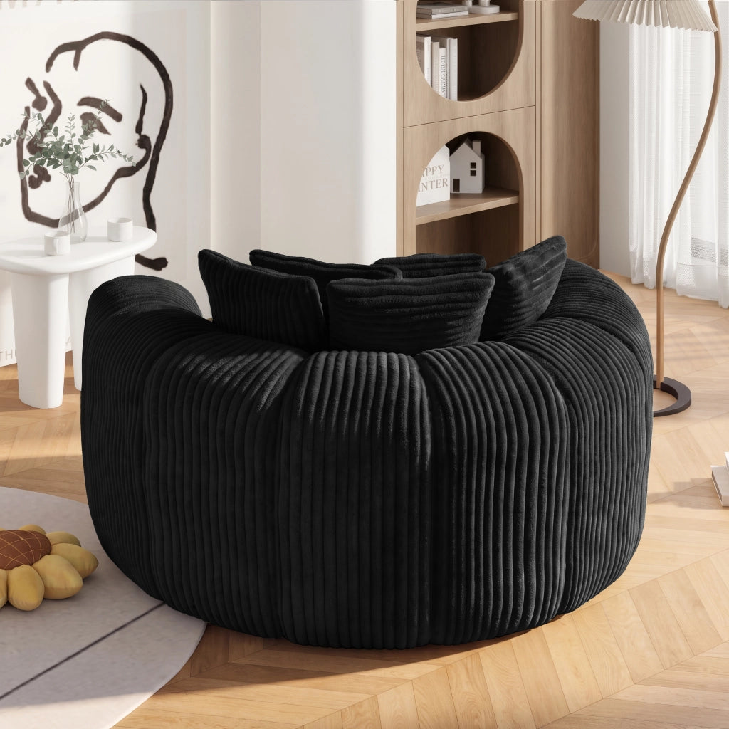 Poltrona lounge in velluto a coste nera con 5 cuscini seduta profonda con molle insacchettate e base antiscivolo
