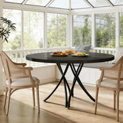 Tavolo da pranzo rotondo nero 120 cm per 4-6 persone con gambe a croce in stile moderno