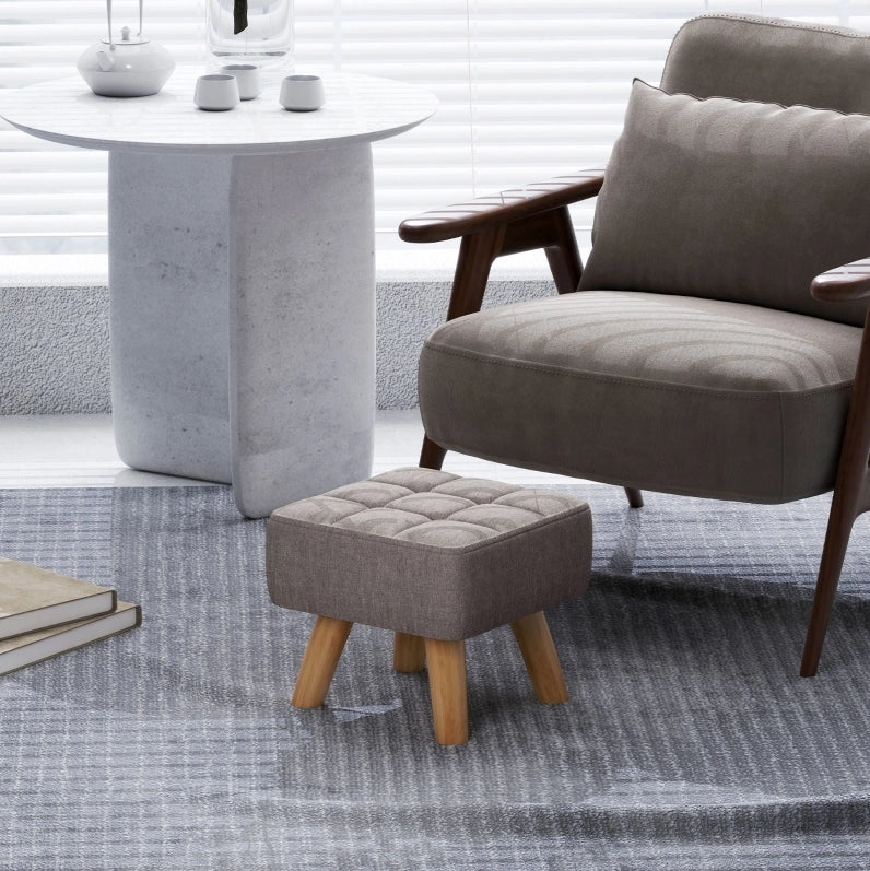 Sgabello imbottito grigio con gambe in legno