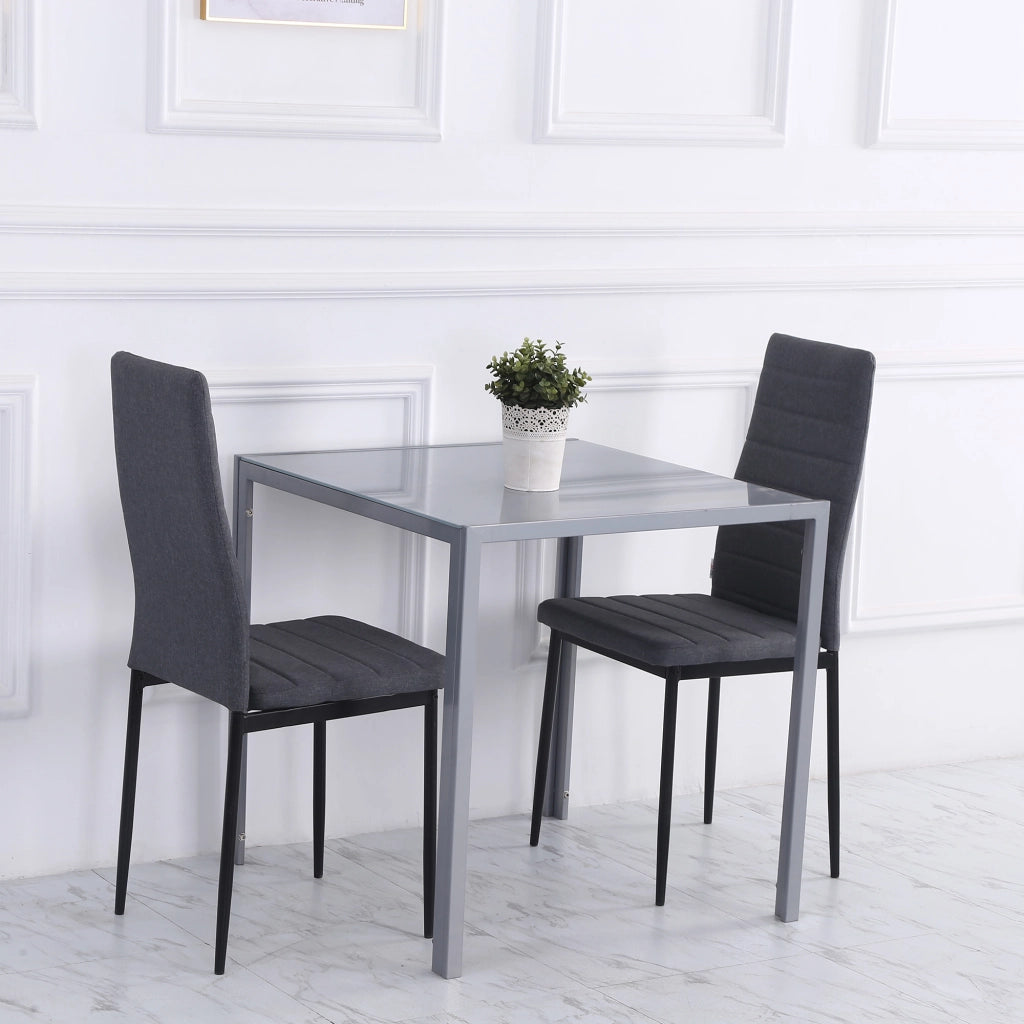 Tavolo da pranzo quadrato per 4 persone in vetro e acciaio grigio, compatto e stabile