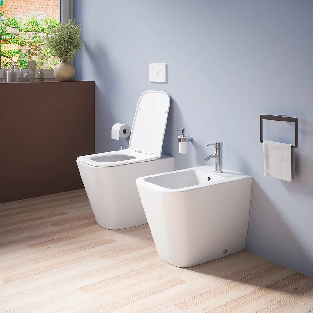 Sanitari filomuro in ceramica bianco lucido vaso rimless sedile soft-close e bidet | Kyoto