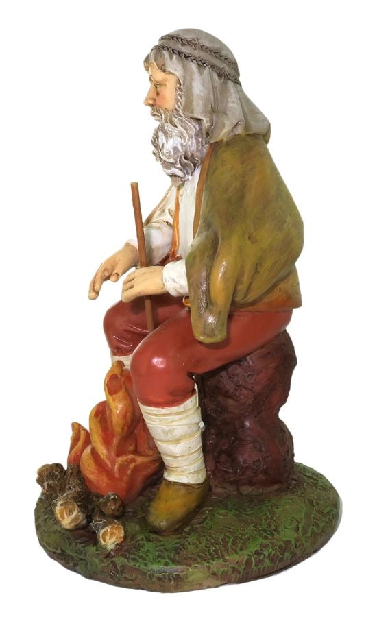 Pastore con fuoco per presepe da 12 cm
