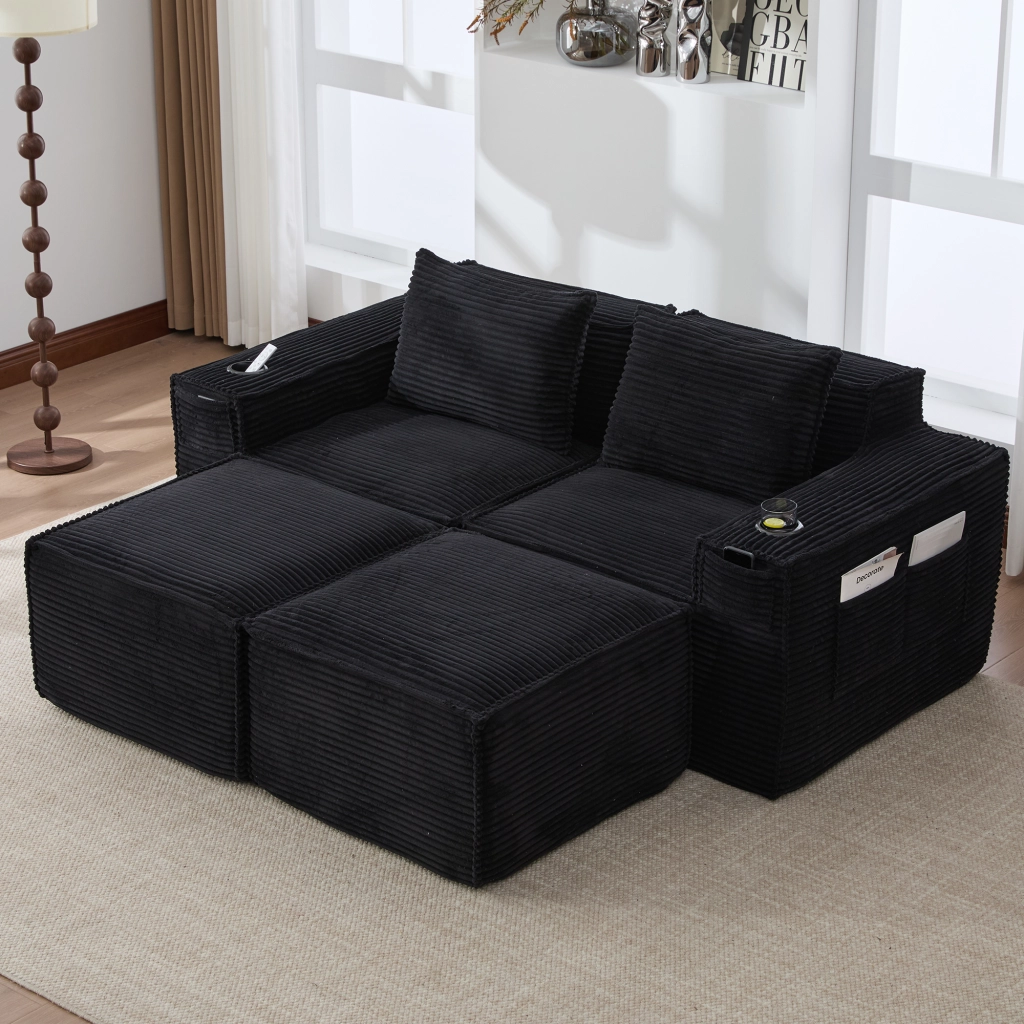 Divano modulare 2 posti con 2 pouf; portabicchieri e tasche laterali; in tessuto a coste nero