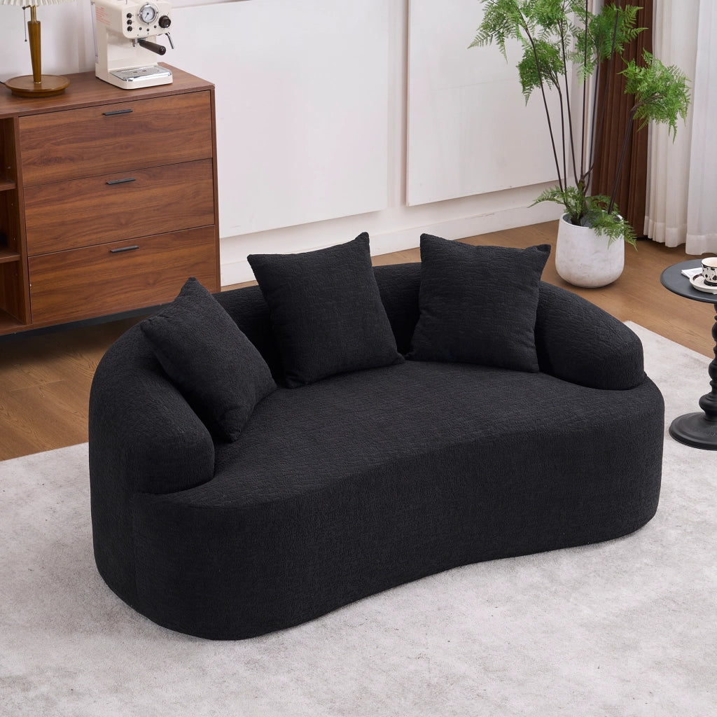 Divano modulare curvo 2 posti con seduta profonda, tre cuscini decorativi e molle insacchettate in ciniglia nera
