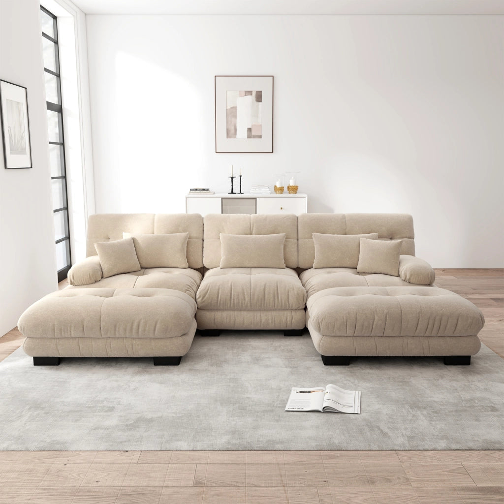 Divano modulare con ottomane mobili; seduta profonda e cuscini di supporto; chenille color caffè chiaro