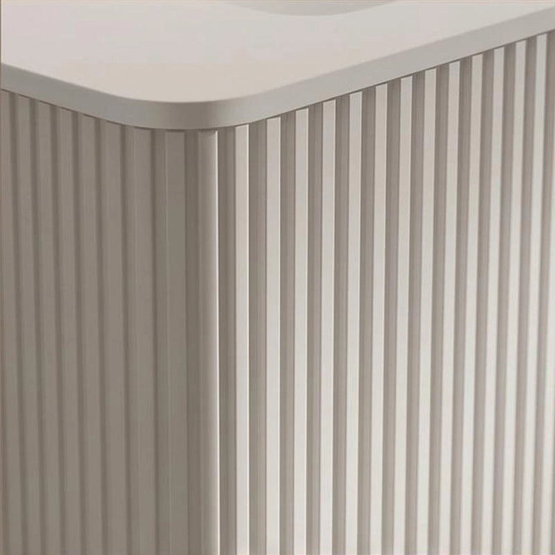 Mobile bagno sospeso 60 cm con lavabo Solid Surface, rilievo fluted, bianco