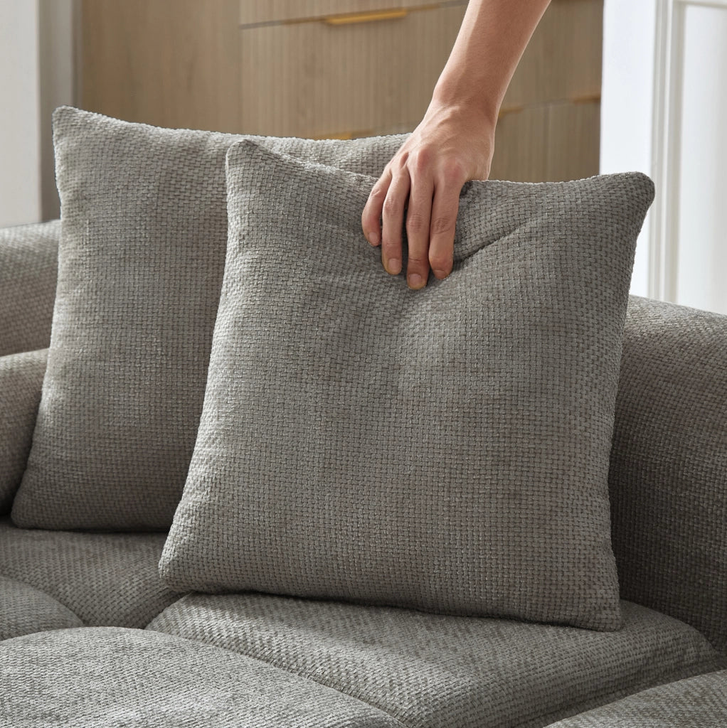 Divano angolare in tessuto chenille grigio chiaro 263 cm con schienale ergonomico e tasca laterale porta riviste
