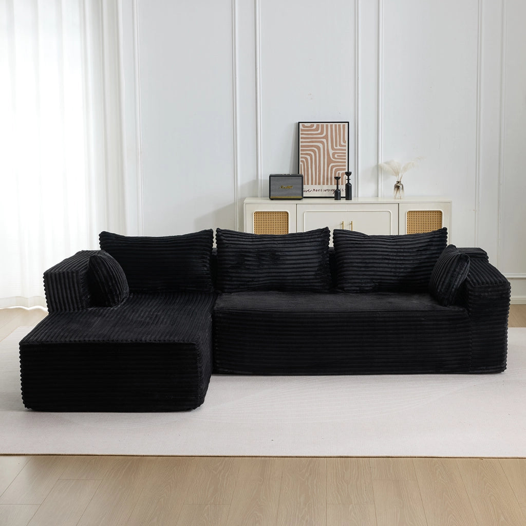 Divano angolare modulare con chaise longue e seduta profonda, senza montaggio, in velluto a coste nero