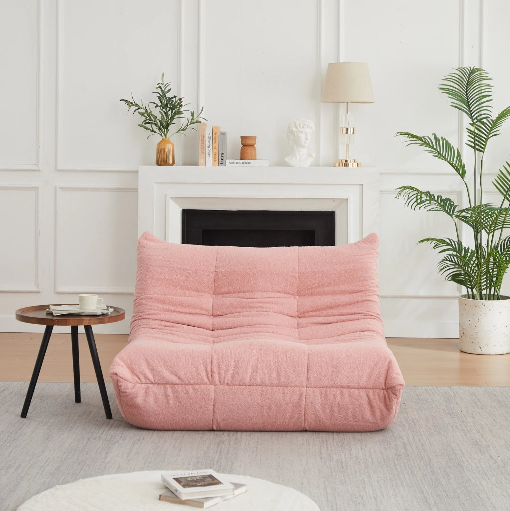 Poltrona da pavimento ULEVR 115 cm in tessuto teddy rosa, imbottitura in schiuma elastica e design con bottoni