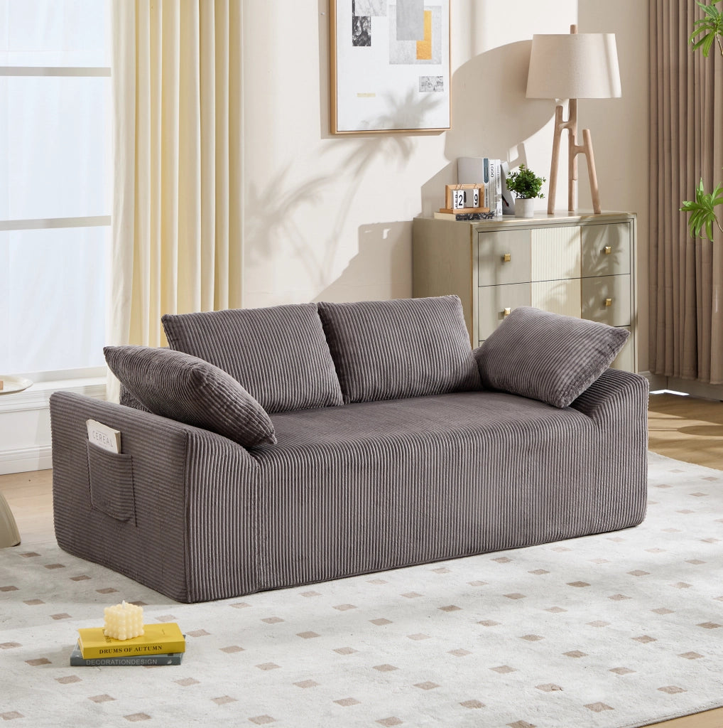 Divano compatto in tessuto con schiuma memory e design senza struttura rigida