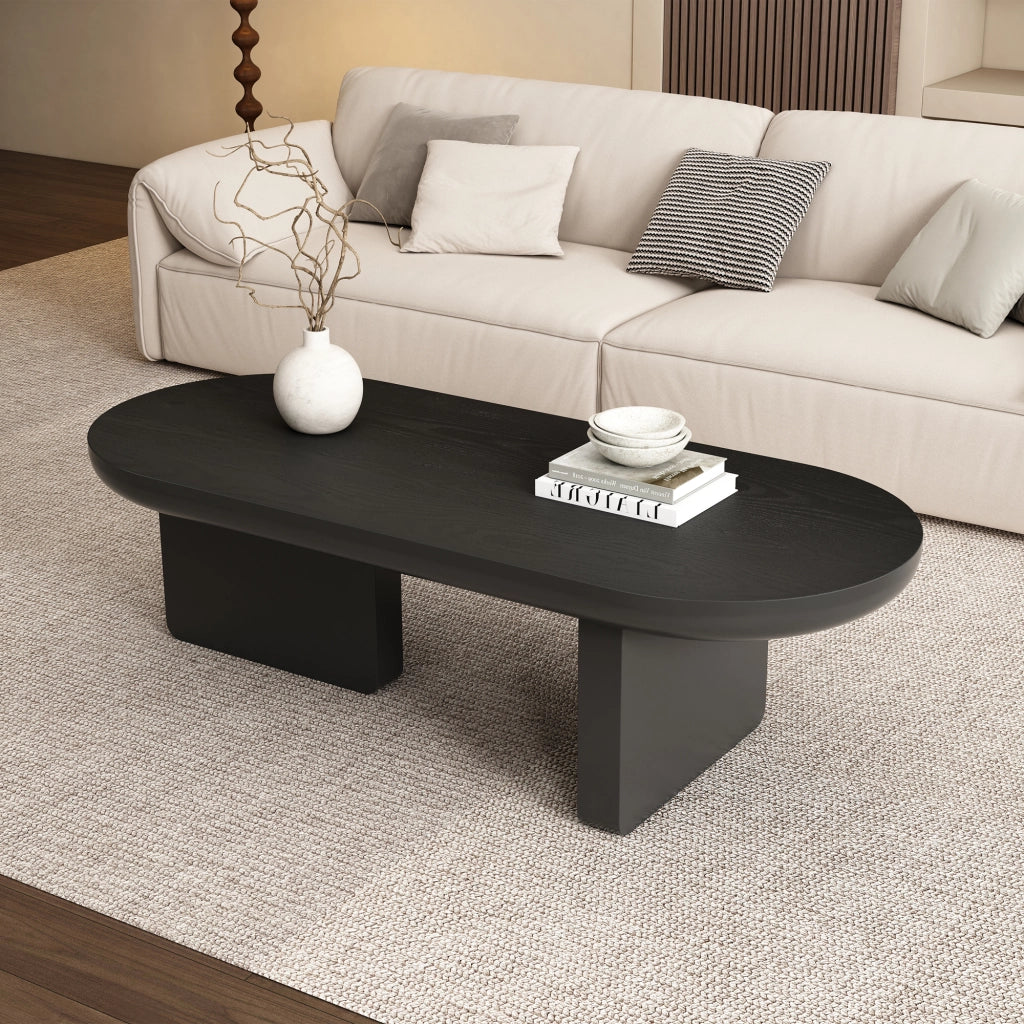 Tavolino basso fisso ovale in MDF nero verniciato a spruzzo con piedini in feltro 119.7 × 49.8 × 35.5 cm