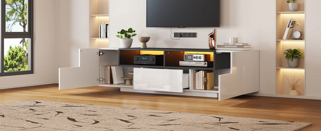 Mobile TV 180x40x48 cm, bianco lucido e nero, con LED, cassetti e design a L. Per TV fino a 75 pollici.
