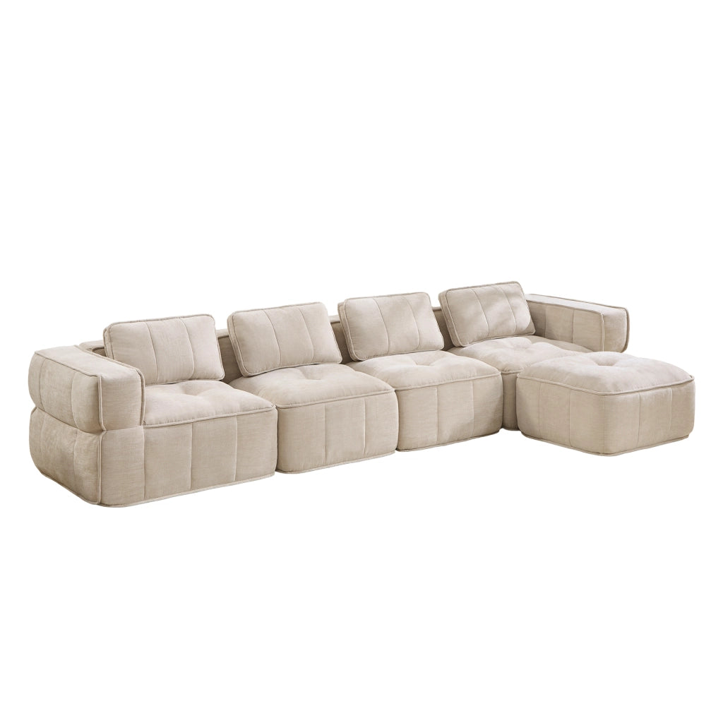 Divano angolare modulare a 4 posti con pouf in poliestere beige senza struttura rigida con seduta profonda e braccioli larghi