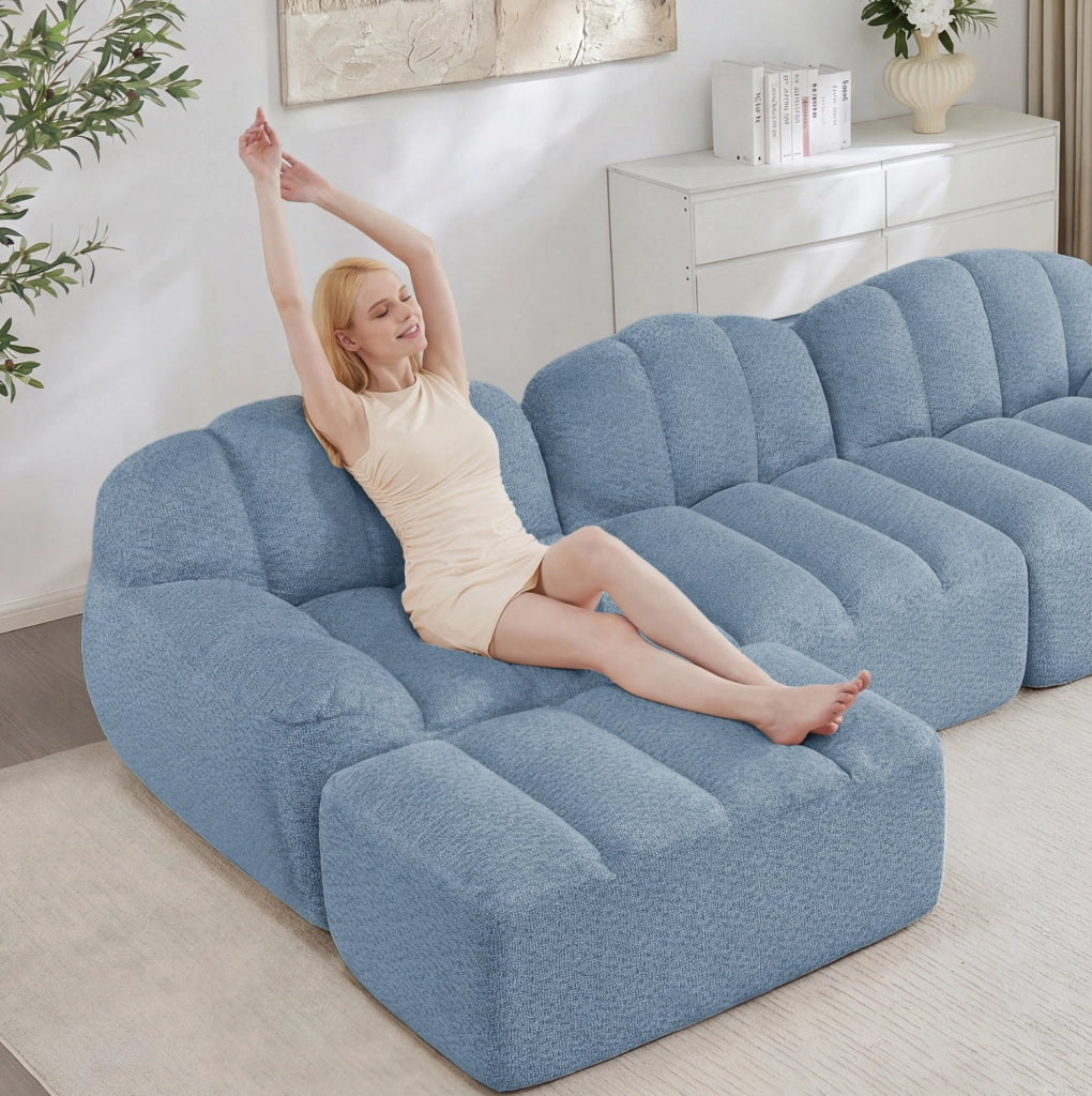 Divano modulare 366x165x79 cm in tessuto blu con pouf, 4 posti