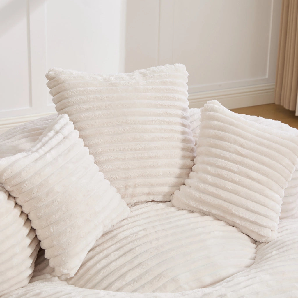Poltrona sacco in velluto a coste con schienale alto e braccioli; beige; 108x108x52 cm