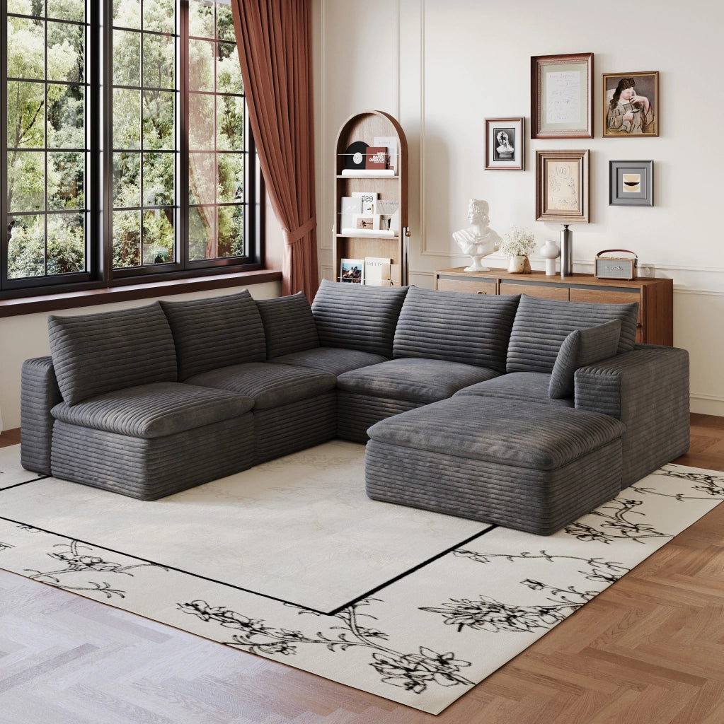 Divano modulare ULEVR in tessuto grigio scuro con supporto in schiuma e design componibile