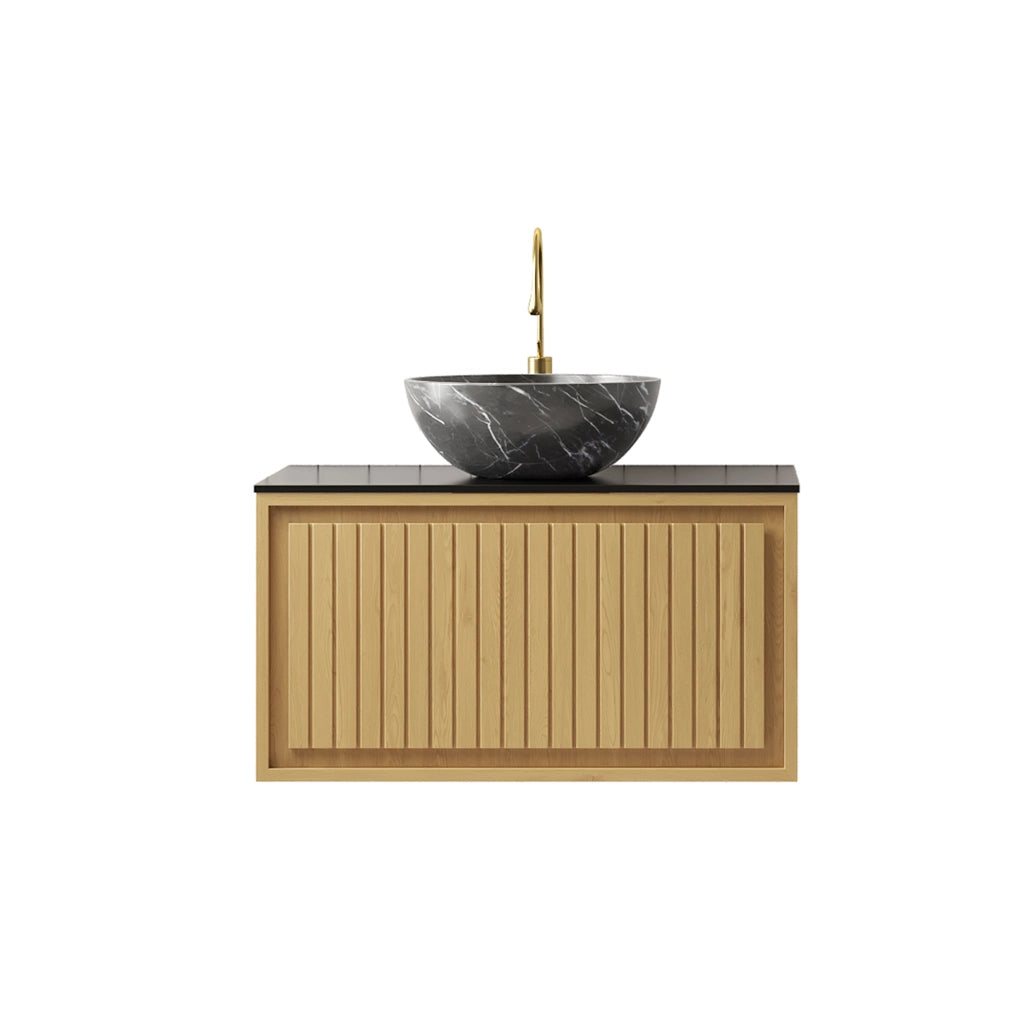 Mobiletto con lavabo sospeso in ceramica effetto pietra con piano in pietra sinterizzata nero e cassetto rovere dorato