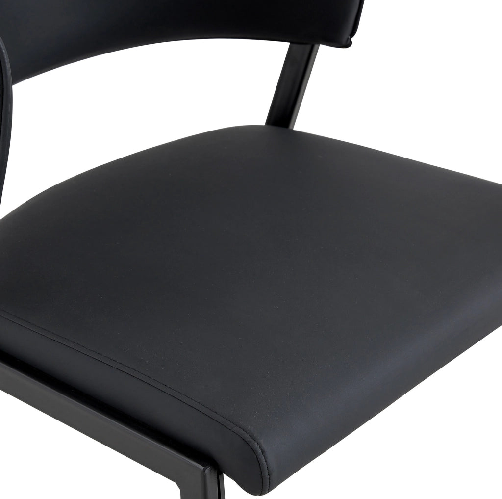 Coppia di sedie da pranzo imbottite nere con struttura in metallo e schienale ergonomico