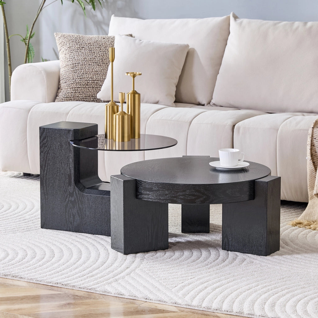 Set di tavolini da salotto rotondi separabili con piano in vetro trasparente grigio e base in MDF effetto legno nero
