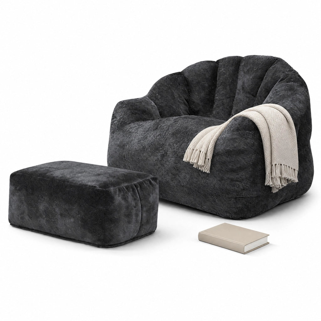Poltrona relax a petalo nera con pouf in flanella