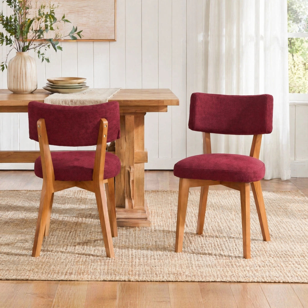 Sedia da pranzo con schienale e seduta imbottiti, gambe in legno massello rosso vino