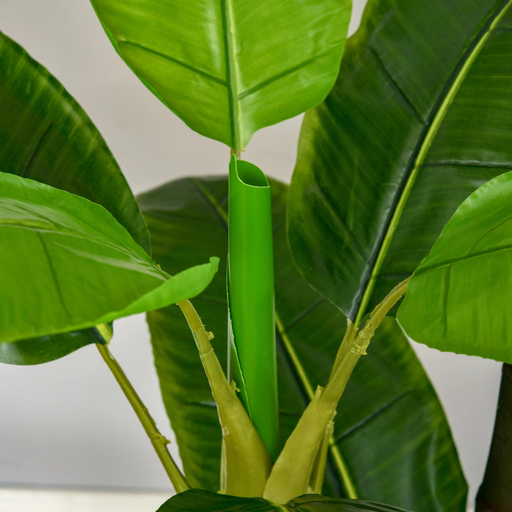 Pianta artificiale di banano 150 cm con 18 foglie vaso nero con erba e base in cemento per interni ed esterni