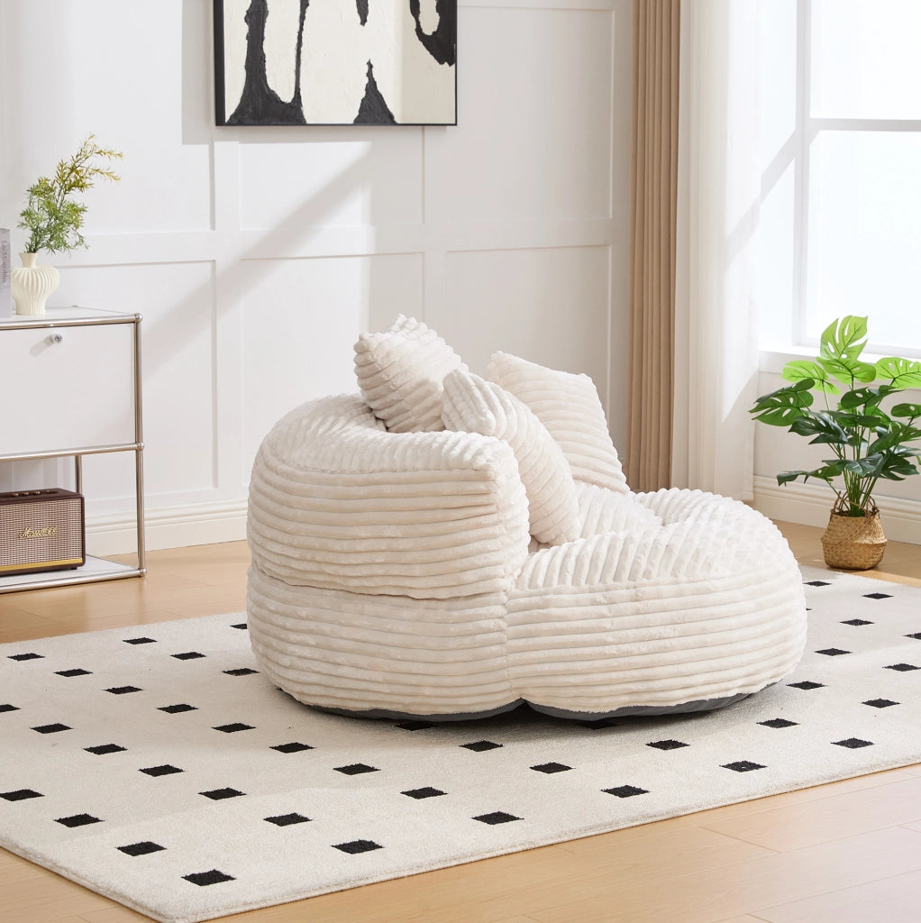 Poltrona sacco in velluto a coste con schienale alto e braccioli; beige; 108x108x52 cm
